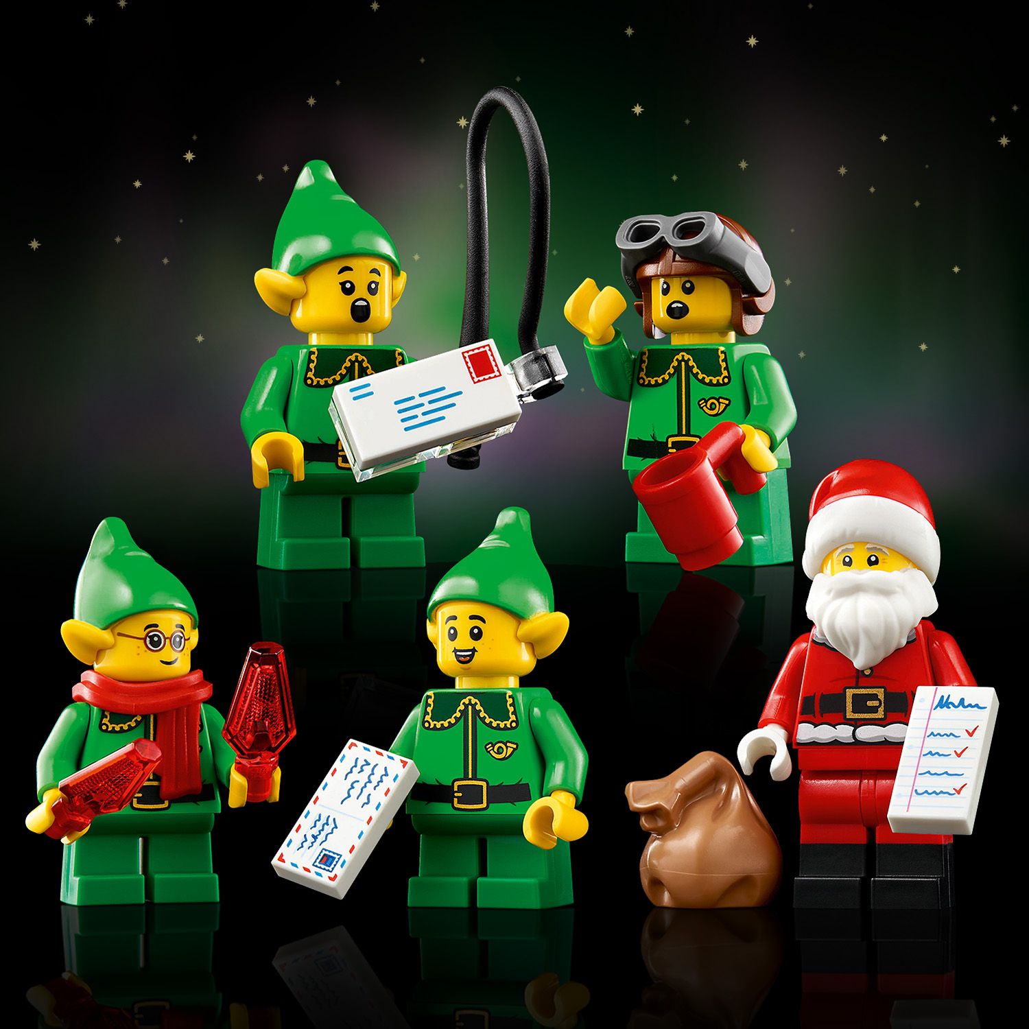 4 LEGO Minifiguren Elfen mit Weihnachtsmann stehen im Kreis