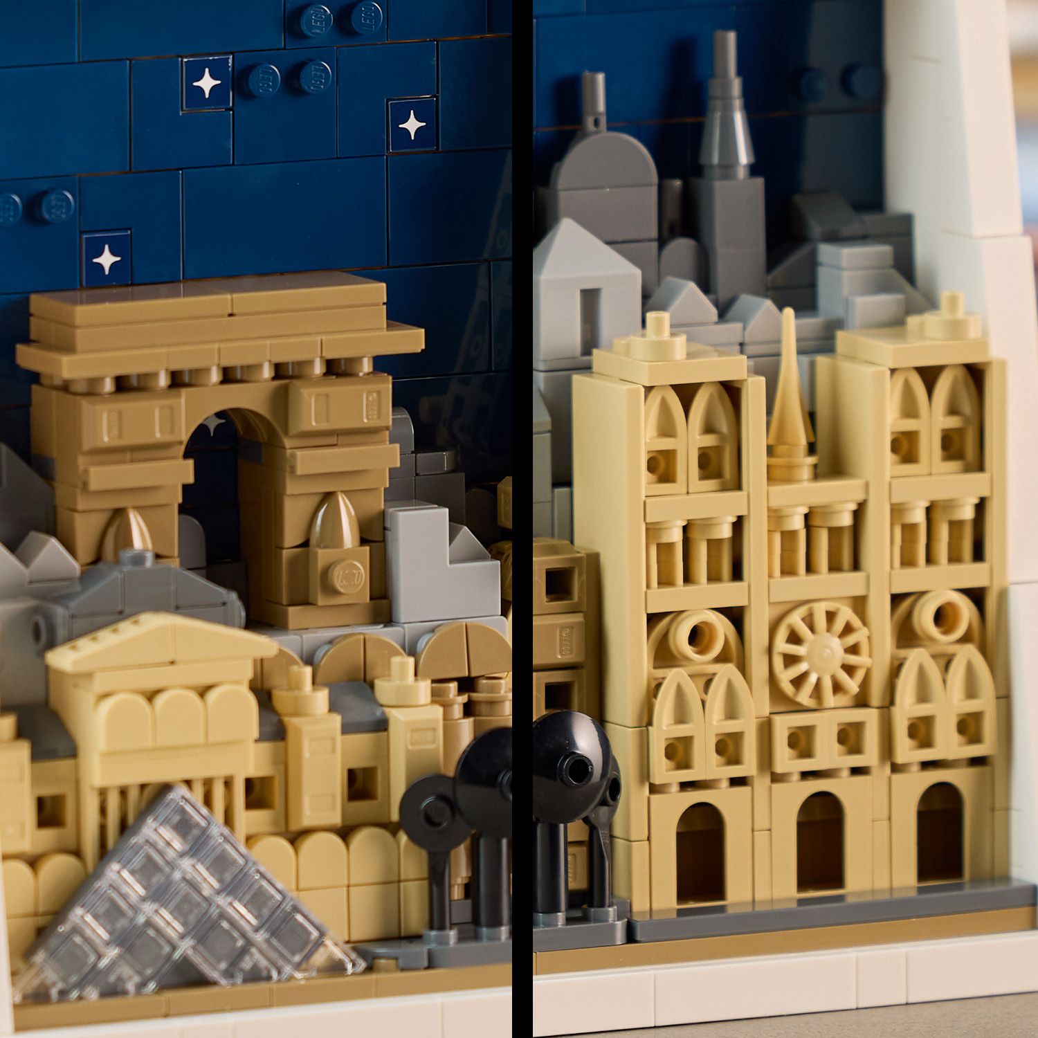 Detailaufnahme eines LEGO Architecture Modells von Paris mit dem Arc de Triomphe, der Kathedrale Notre-Dame und der gläsernen Pyramide des Louvre vor einem dunkelblauen Hintergrund mit weißen Sternen.