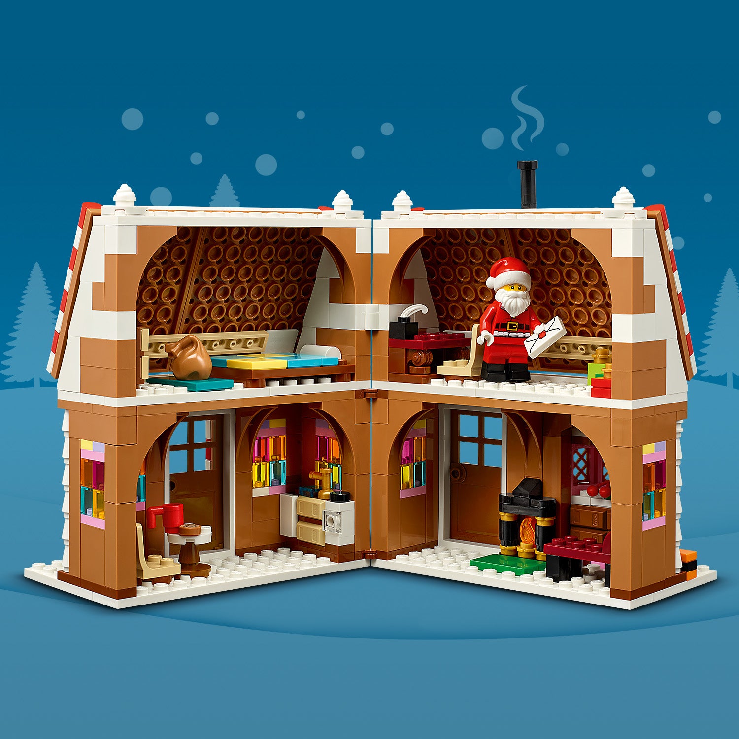 Aufgeklapptes LEGO Haus mit zwei Etagen, oben ein Bett und eine Figur mit rotem Mantel und weißem Bart, unten ein Kamin und Möbel