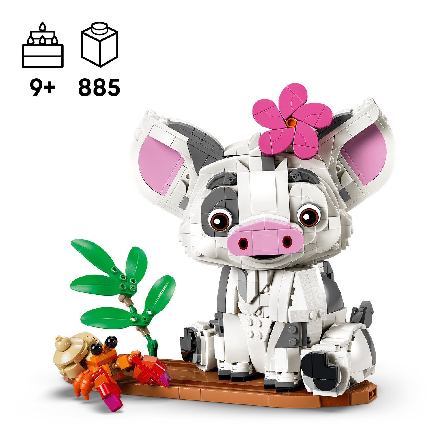 LEGO Modell eines sitzenden Schweins mit rosa Blume am Kopf und einem kleinen Krebs mit Muschel auf braunem Untergrund