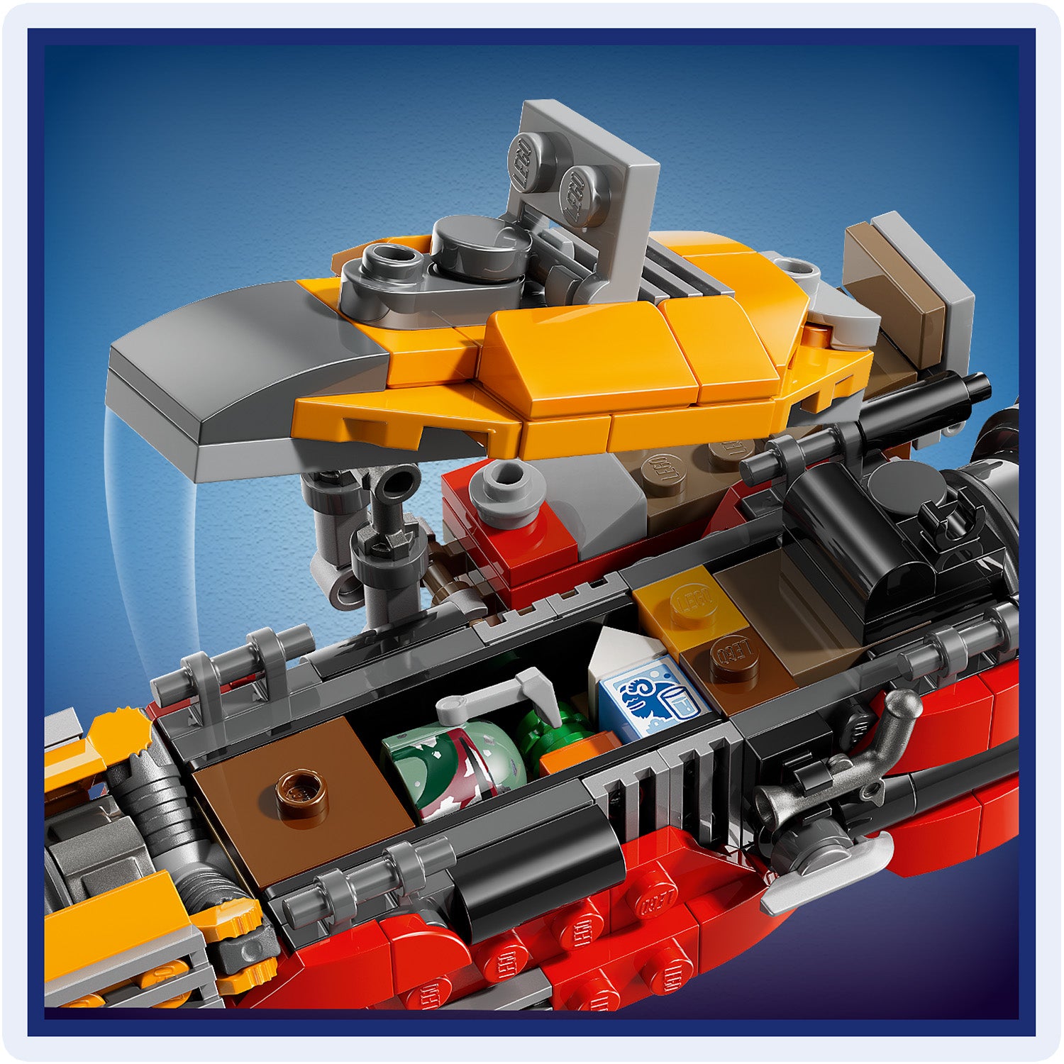 Nahaufnahme eines LEGO Star Wars Speeders mit orange-schwarzem Cockpit, in dem eine Minifigur mit grün-weißem Helm sitzt.